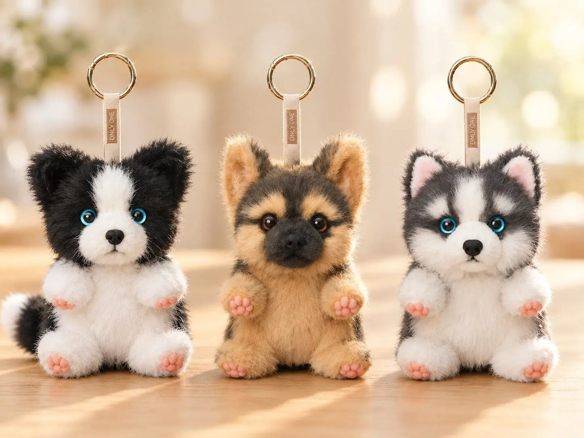 The Charm Trio — three seated mini plush charms: Border Collie, German Shepherd and Husky